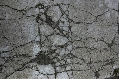 Damaged And Broken Asphalt Background Texture