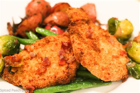 Pork chops are breaded with italian breadcrumbs and parmesan cheese then baked for a flavorful dinner. Crispy Breaded Pork Chops