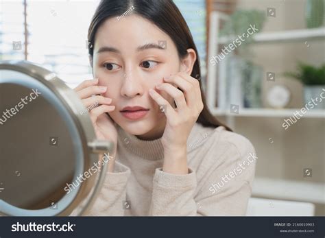 Young Asian Woman Looking Mirror Worried Stock Photo 2160010903
