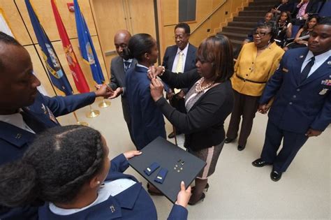 Overcoming Struggles Air Force Rotc Cadet Graduate Takes Oath To Become 2nd Lieutenant