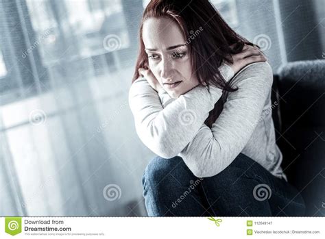 Stressful Unhappy Woman Hugging Herself And Looking Down Stock Image Image Of Emotional