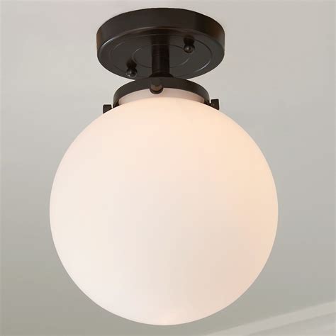 This Beautiful Mid Century Modern Ceiling Light Features A White Glass