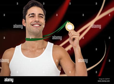 Composite Image Of Athlete Posing With Gold Medals Around His Neck