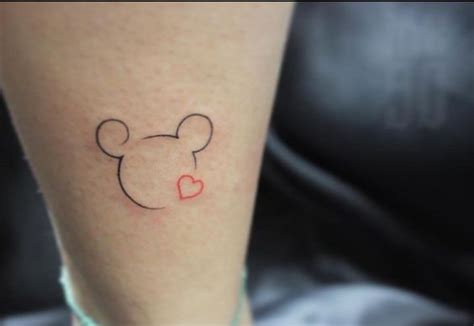 Here we can see disney's castle and a word that say dream. Magical Disney Tattoo - Disney Simple Tattoos - Simple ...