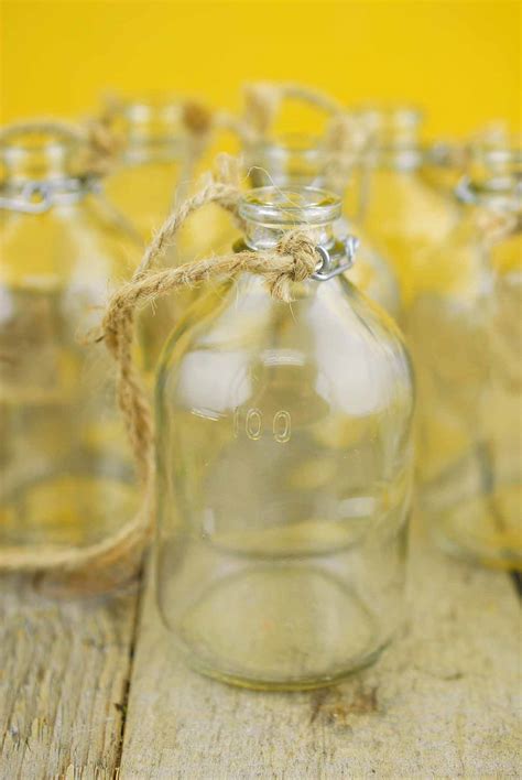 6 Hanging Glass Bottles With Twine