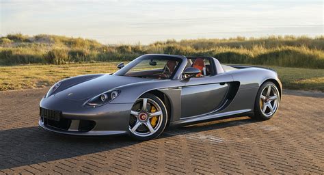 Porsche Carrera Gt Once Owned By F1 Champ Jenson Button Sells Just Shy