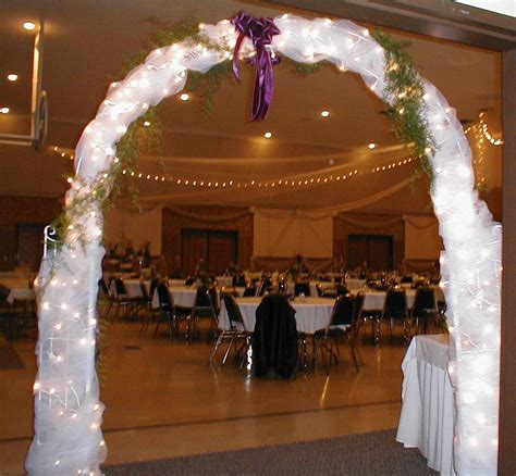 The most common wedding arch rental material is metal. http://dyal.net/wedding-flower-arches Reception Hall ...