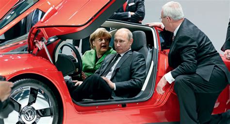 The german chancellor is heading to moscow for talks with the russian president. Russian President Putin Checks Out VW's XL1 Together with ...