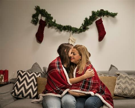 Free Photo Mother Kissing Her Daughter For Christmas