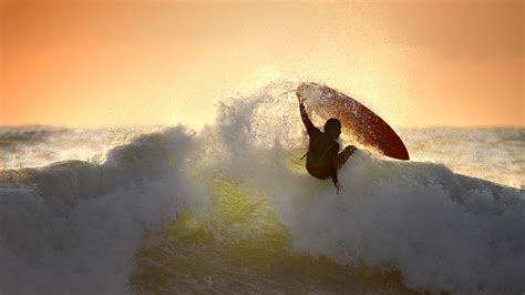 Surfing Waves In Sunset High Definition Wallpapers Hd Wallpapers