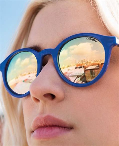 Sunny Days Make For Fun Sunnie Style In Mirrored Blue Carrera Sunglasses