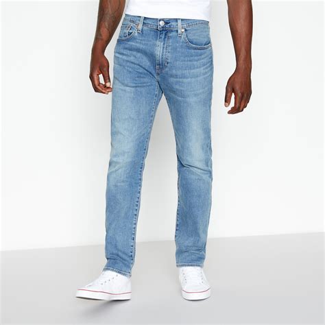 Levis Denim Mid Wash All Seasons Technology 502 Tapered Jeans In
