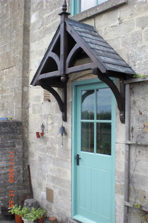 Wood also pairs well with brickwork. ASHCOMBE - Timber Door Canopies- Wooden front door porch ...