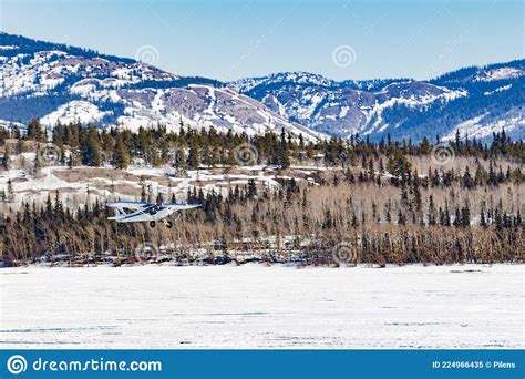 Airplane Take Off On Frozen Lake Laberge Yt Canada Stock Image Image