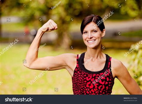 Pretty Fitness Model Flexing Her Bicep Stock Photo 40279864 Shutterstock