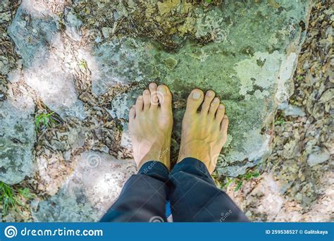 Man Tourist Climb Barefoot The Mountain To The Ostrog It Is A