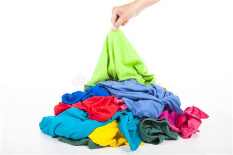 Hand Pick Up Shirt In Pile Of Clothes Stock Photo Image Of Mixed