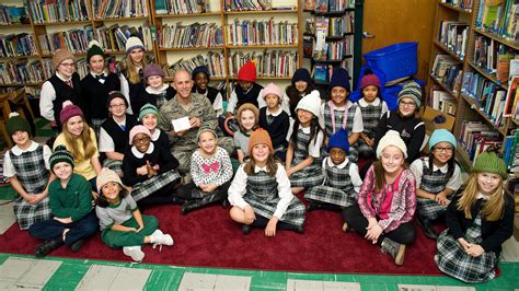 Holy Cross Knitting Club Donates Hats For Deployed Members