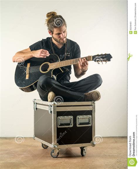 Handsome Man Sitting And Playing Guitar Stock Image Image Of Long