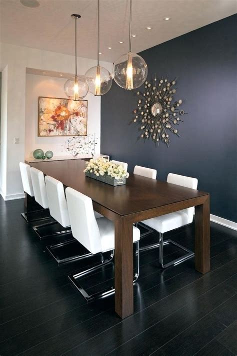 Sleek blue velvet fabric upholstery feels exceptionally soft to the touch and complements the striking goldtone finish on the base. Navy Blue Dining Room Navy Dining Room Chairs Navy Blue ...