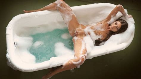 What S The Name Of This Soapy Brunette Girl Sitting In The Bathtub With