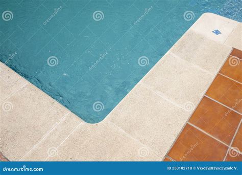 Edge Of A Swimming Pool With White Tiles Summer Time Concept Stock