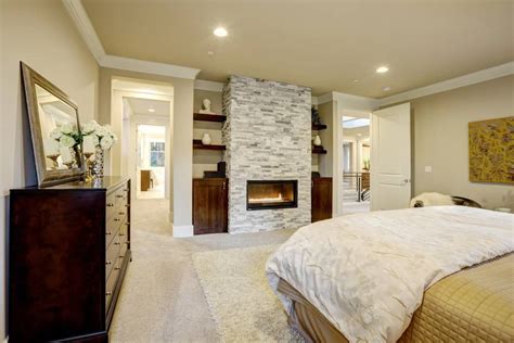 A fire glows in the master bedroom of giorgio armani's swiss retreat. 75 Impressive Master Bedrooms with Fireplaces (Photo Gallery)