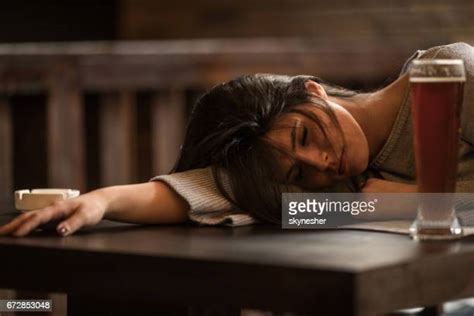 Passed Out Drunk Woman Photos And Premium High Res Pictures Getty Images