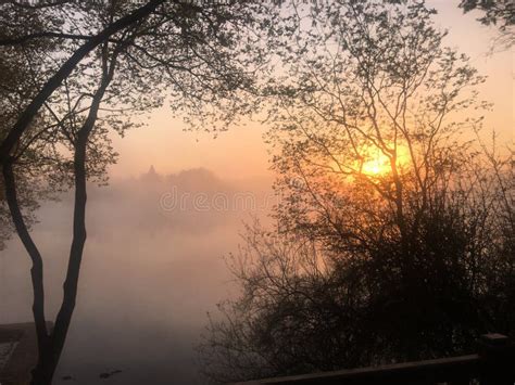An Orange Sunrise Through The Mist Stock Image Image Of Rising Light