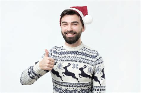 Premium Photo Happy Funny Man In Red Christmas Hat Show Thumbs Up And Good Luck