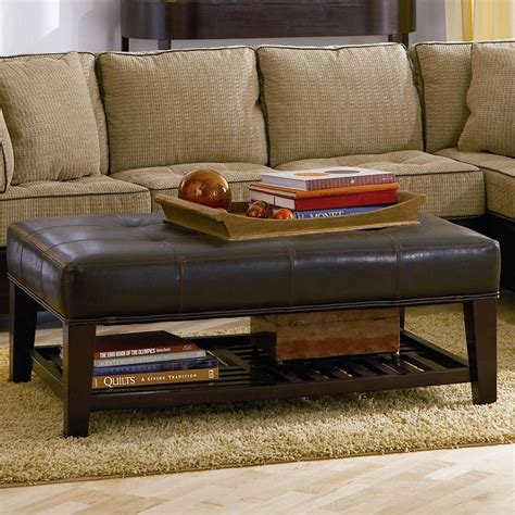 Coaster Ottomans Contemporary Faux Leather Tufted Ottoman ... It has a large round wooden frame entirely padded and upholstered in quality linen in beige and creamy tones with a printed black script design and rich button tufting.