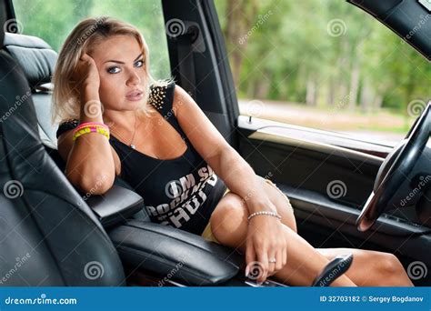 Portrait Of Woman Sitting In The Car Stock Photography Image 32703182