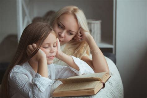 Mother With Daughter Reading Book Stock Image Image Of Cute People 61969833