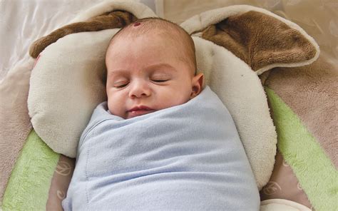 Swaddling can help babies adjust to their surroundings - The Sunday 