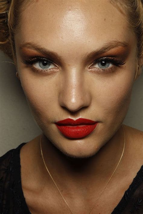 Candice Swanepoel Backstage At Jean Paul Gaultier Spring 2012 Pfw