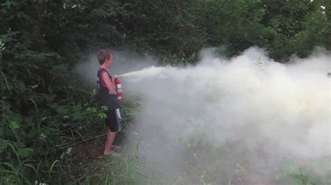 The key to putting out a fire with an extinguisher. Spraying A Fire Extinguisher - YouTube