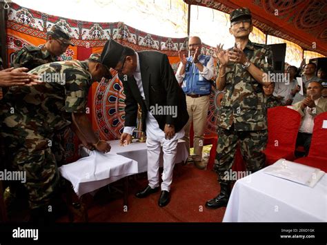 nepal s prime minister jhala nath khanal presses the button to detonate the last landmine