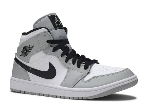 Grey also lands on the wings logo on the heel while a white midsole. Air Jordan 1 Mid Light Smoke Grey - kickstw