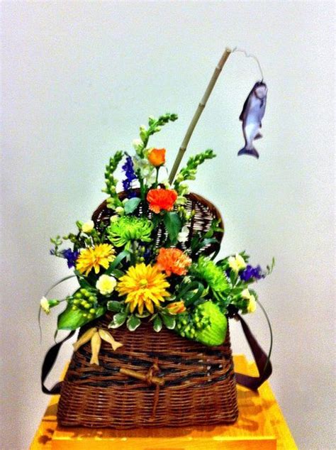One member of the detail represents the parent service of the deceased veteran. Image result for fishing themed funeral arrangement ...