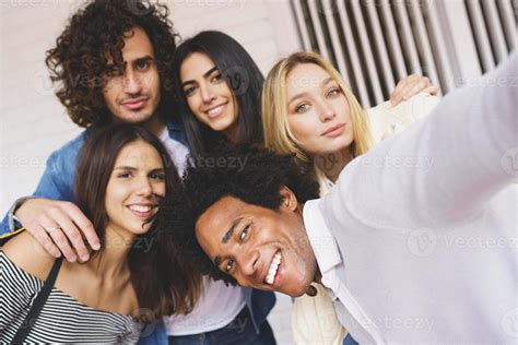 Multi Ethnic Group Of Friends Taking A Selfie Together While Having Fun Outdoors 4834275 Stock