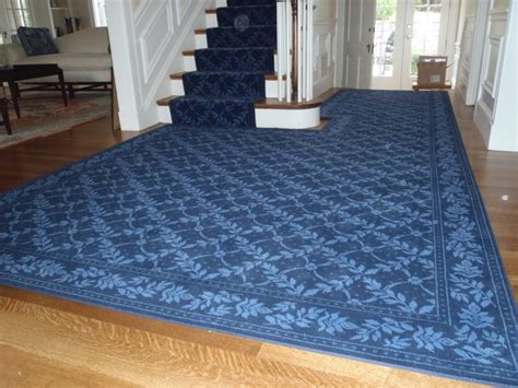 A subdued blue is easier to work with from a the latest carpet trends for stairs include intricately designed carpets and carpet runners. Custom Blue Carpet on Stairs and Foyer - Transitional ...