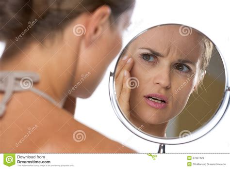 Concerned Young Woman Looking In Mirror Stock Image Image Of Model