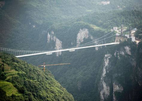 To add to the excitement, it also plans the world's tallest commercial bungee jump at the bridge's highest point situated around 400 m (1,312 ft) above the. China's Zhangjiajie Grand Canyon Glass Bridge is not for ...