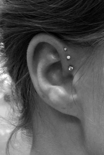 Cute multiple ear piercing ideas combinations cartilage helix rook conch crystal earring studs barbells 16g. 17 Chic Ear Piercing Ideas for Fashionistas to Copy ...