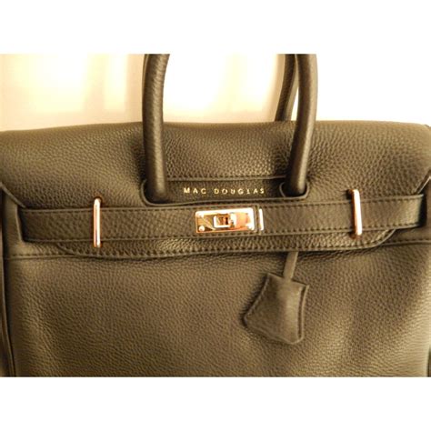 Le sac bandoulière jazzy xs de mac douglas (jazzyxs) séduit avec son look intemporel et chic. Sacs à main Mac Douglas Sac Romy xs Cuir Noir ref.24492 ...