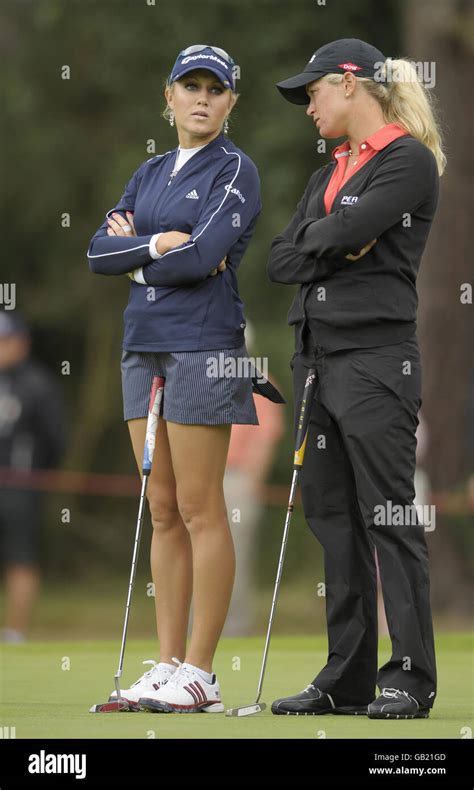 Natalie Gulbis Left And Suzanne Pattersen Talk On The 14th Green
