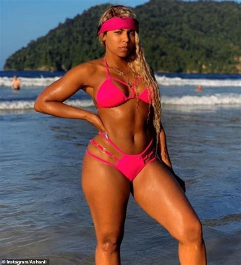 Ashanti Flaunts Her Incredibly Toned Physique In Hot Pink Bikini During