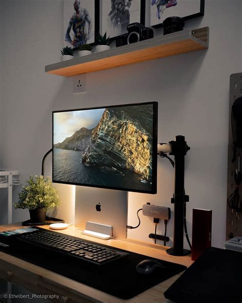 here is a modern macbook desk setup by ig user ethelbert photography this clean workspace