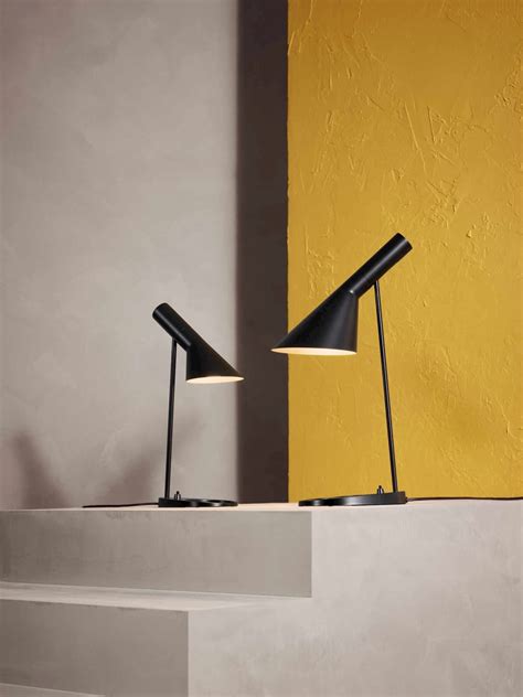 The angle of the shade can be adjusted to optimize light distributi Louis Poulsen AJ Mini Black Table Lamp | Buy online at Deplain.com