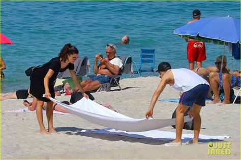 Shirtless Derek Hough Hits The Beach With Girlfriend Hayley Erbert In